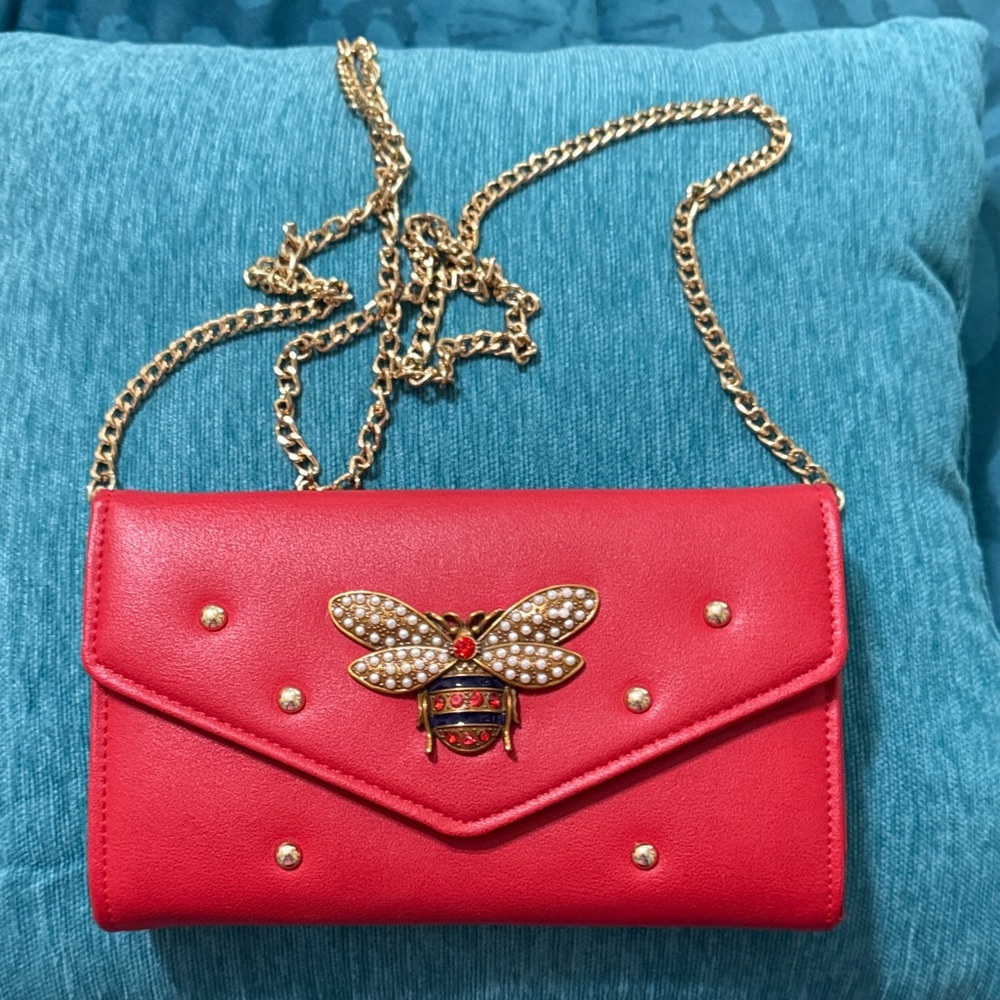 Chic Red Clutch with Gold Chain and Bee Accent
